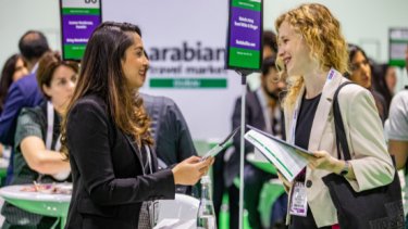 Two women talking talking at the ATM Event